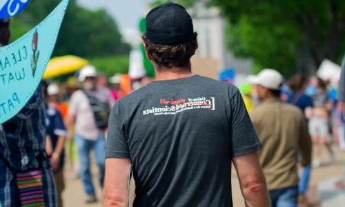 The back of a Union of Concerned Scientists shirt where the word "concerned" is crossed out and replaced with "pissed-off".